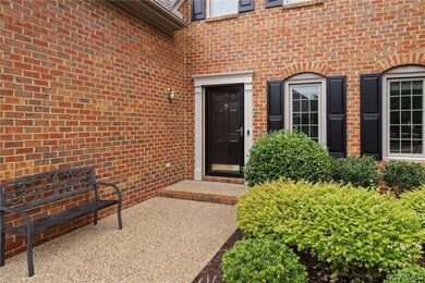 Doorway to property with a patio