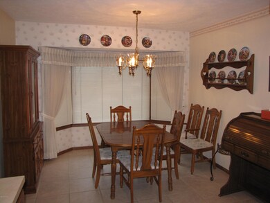 Dining room connected to the kitchen.