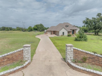 French country home with driveway, a front lawn, an attached garage, stone siding, and a shingled roof