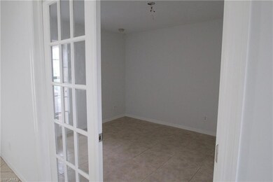 A spacious den with french doors