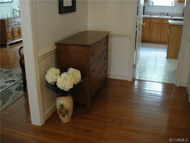 Spacious and welcoming foyer with hardwoods and mo