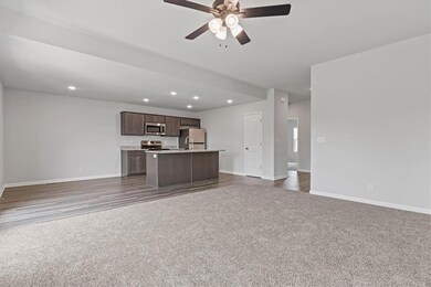 2102 Creek View Ln, Raymore, MO 64083 - photo 4