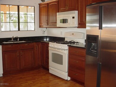Kitchen with Cherry cabinets