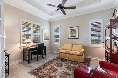 Office area with plantation shutters, ornamental m