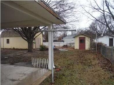2 sheds in back yard