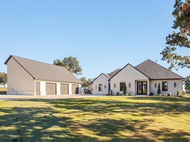 View of front of home featuring a front lawn and a