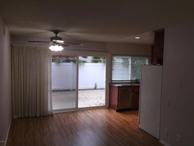 Dining area with wood type flooring
