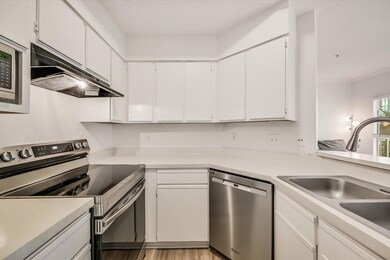 Kitchen featuring appliances with stainless steel