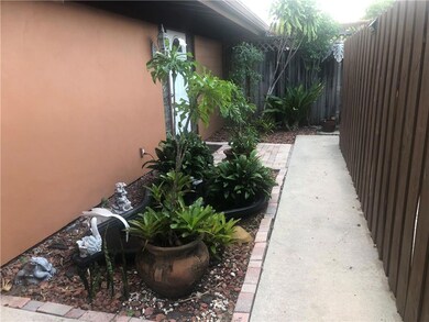 walkway leading to front door entrance