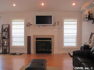 Living Room. Hardwood floor, the gas fireplace and