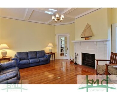 Living Room. Original oak floors and high coffered