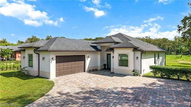 110 6th St NE, Naples, FL 34120 - photo 2