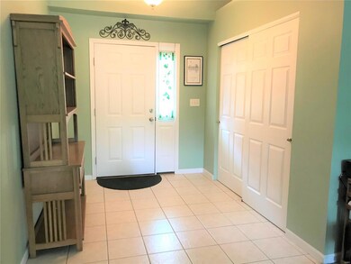Entry foyer is wider than most.  Ceramic Tile and 