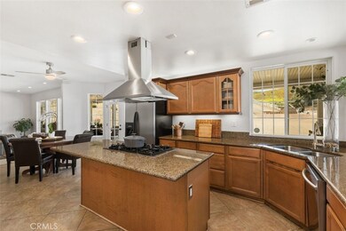 Ample kitchen Island, counter space and storage.  Walk in pantry out of frame but in another photo coming