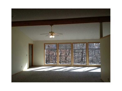 Living Room. Lots of windows and a great view!