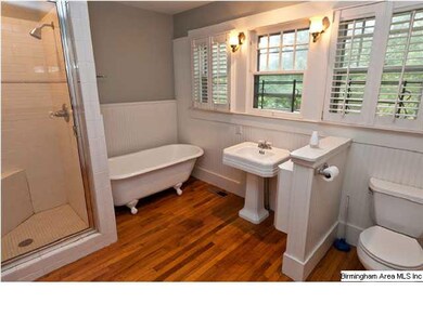 Master Bathroom with pedestal sink, ornate tub, se