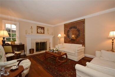 Living Room has a beautiful fireplace with paneled