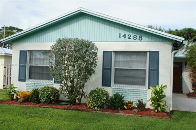 Beautifully Landscaped Front of the Large 2 Car Ga