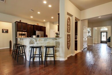 Kitchen featuring stainless steel appliances, a k