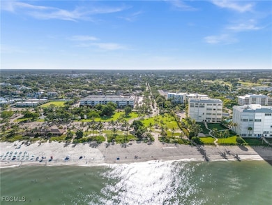 Bird's eye view of waterfront with a beach
