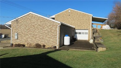 3RD GARAGE IN REAR, LOTS OF POTENTIAL...