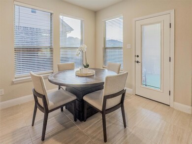 Charming breakfast area with tiled floors and abun