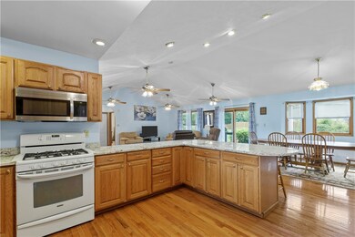 EAT AROUND THE KITCHEN ISLAND OR DESIGNATED DINING AREA OF THE GREAT ROOM