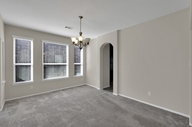 Formal Dining- Carpet was placed on top of the til