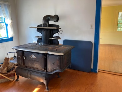 Kitchen with wood cookstove.