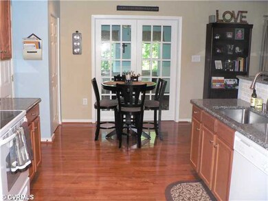 Kitchen - Kitchen with Hardwood, New Granite Count