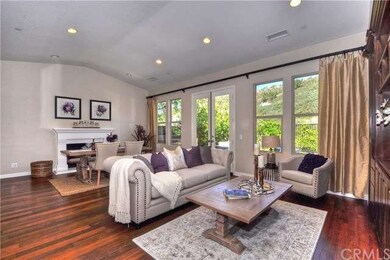 Beautiful Wood Flooring Runs Throughout Main Livin