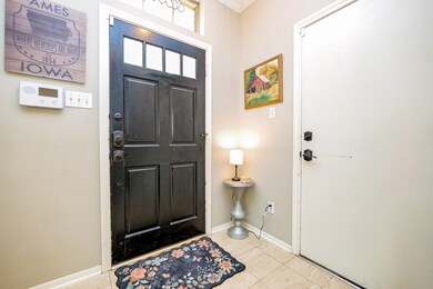 Step through a stunning front door into a warm, we