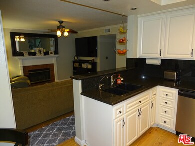 Kitchen looking out to Family Room