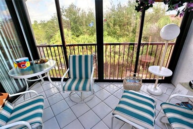 SPACIOUS SCREENED & GLASS ENCLOSED PATIO WITH GARD