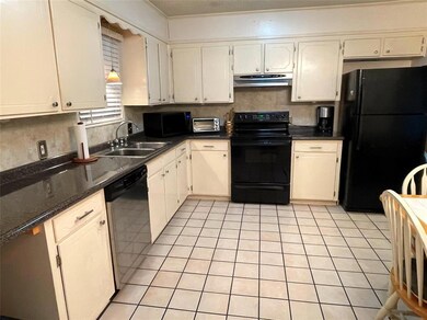 Kitchen w lots of Cabinets