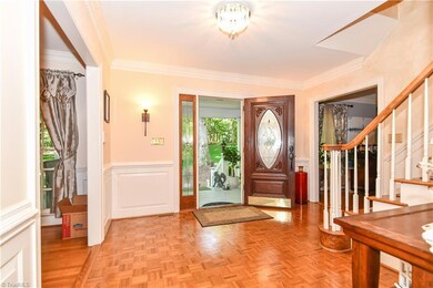 Spacious parquet floor foyer