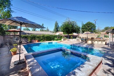 Pool with Ozone filter system, perfect for sports in pool, and spa seats 12, BBQ, fire pit and separate play yard.