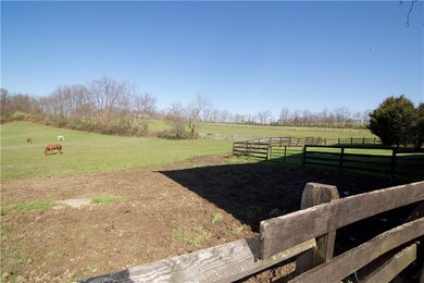 Twelve acres of fenced in pasture, and, of course,