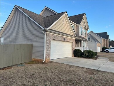 View of home's exterior featuring brick siding, co