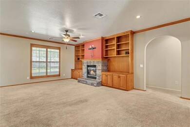 Large living room with custom built cabinets
