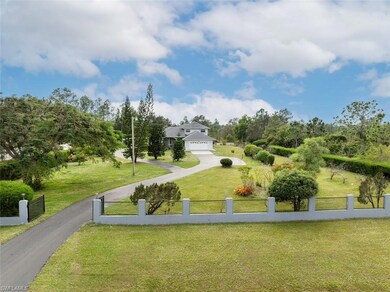 Front view showing gate and front of fence.