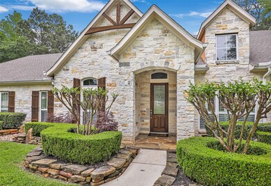 Easy-care landscape welcomes you to the lovely leaded 8 foot front door