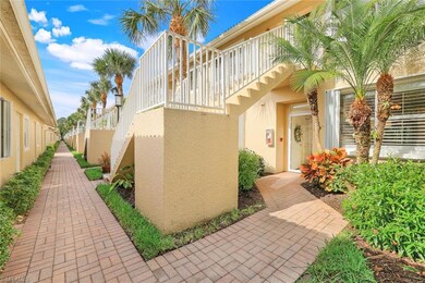 Entrance to property featuring stucco siding