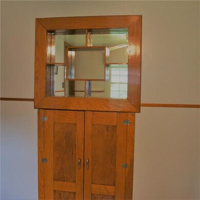 Custom built in cabinets in the kitchen for added 