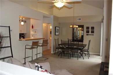 Looking into living room/dining room area from top
