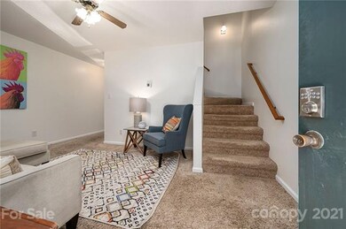 Entryway leading to Living Room and Upstairs