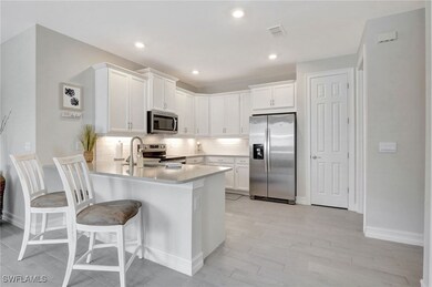 Kitchen featuring appliances with stainless steel
