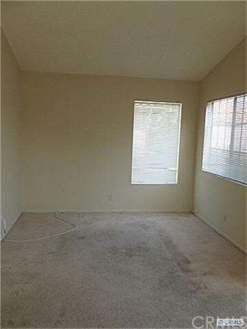 Living room with vaulted ceiling