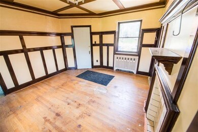 First floor Dining room features original woodwork