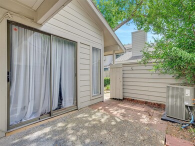 Secondary bedroom has a sliding door that connects